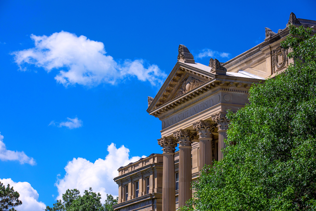Image shows Beardshear Hall with a blue sky in the background.